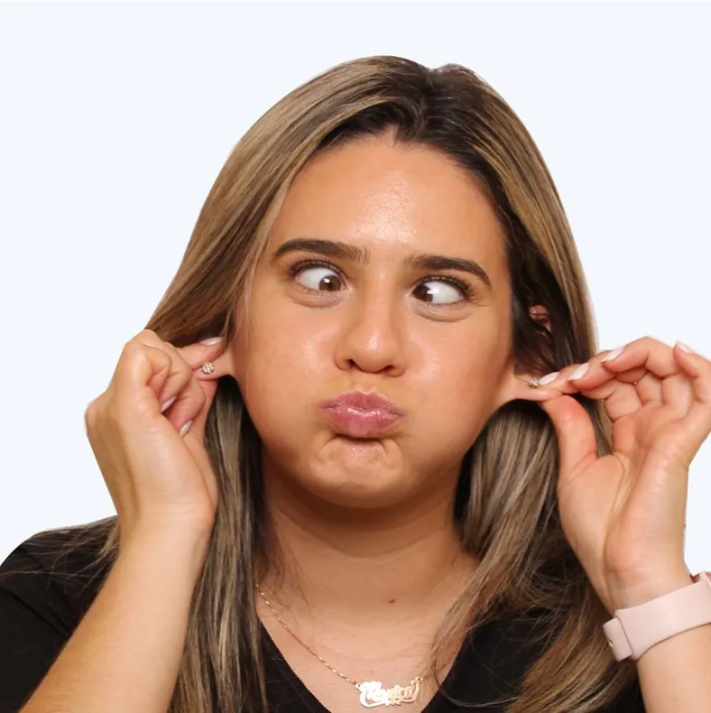 Meier Orthodontics team member making a playful face