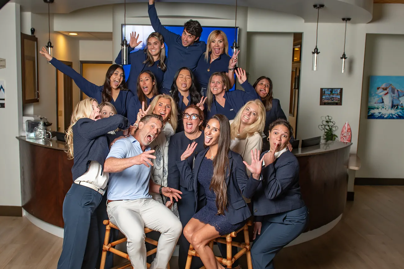 Smiling photo of our team